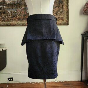 Black peplum skirt (no label)